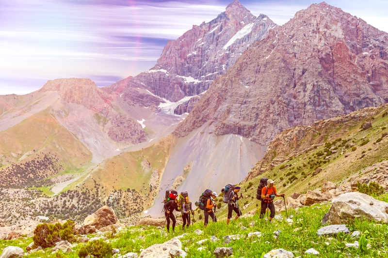 people hiking in the mountain
