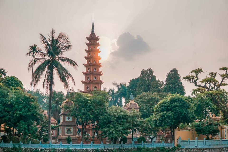 pagoda before sunset in Hanoi, Vietnam. With comfortable weather, Hanoi is a great place to travel to in October.