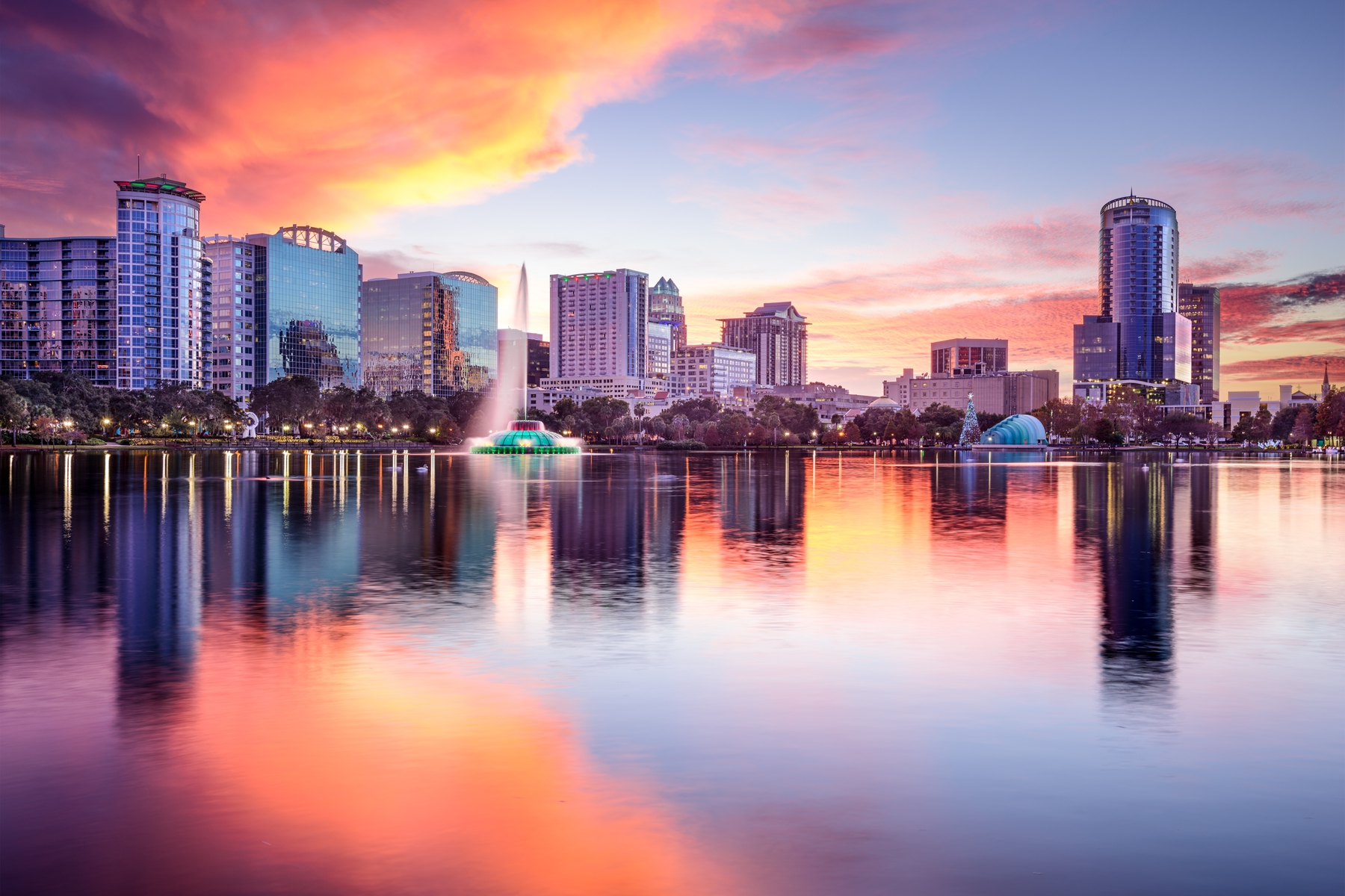 Orlando's skyline glows during an orange sunset