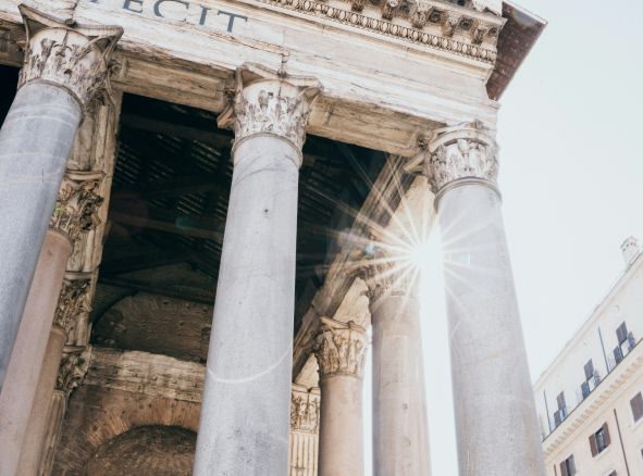 Columns from the exterior of the Roman Pantheon in the sunlight, in the centre of Rome