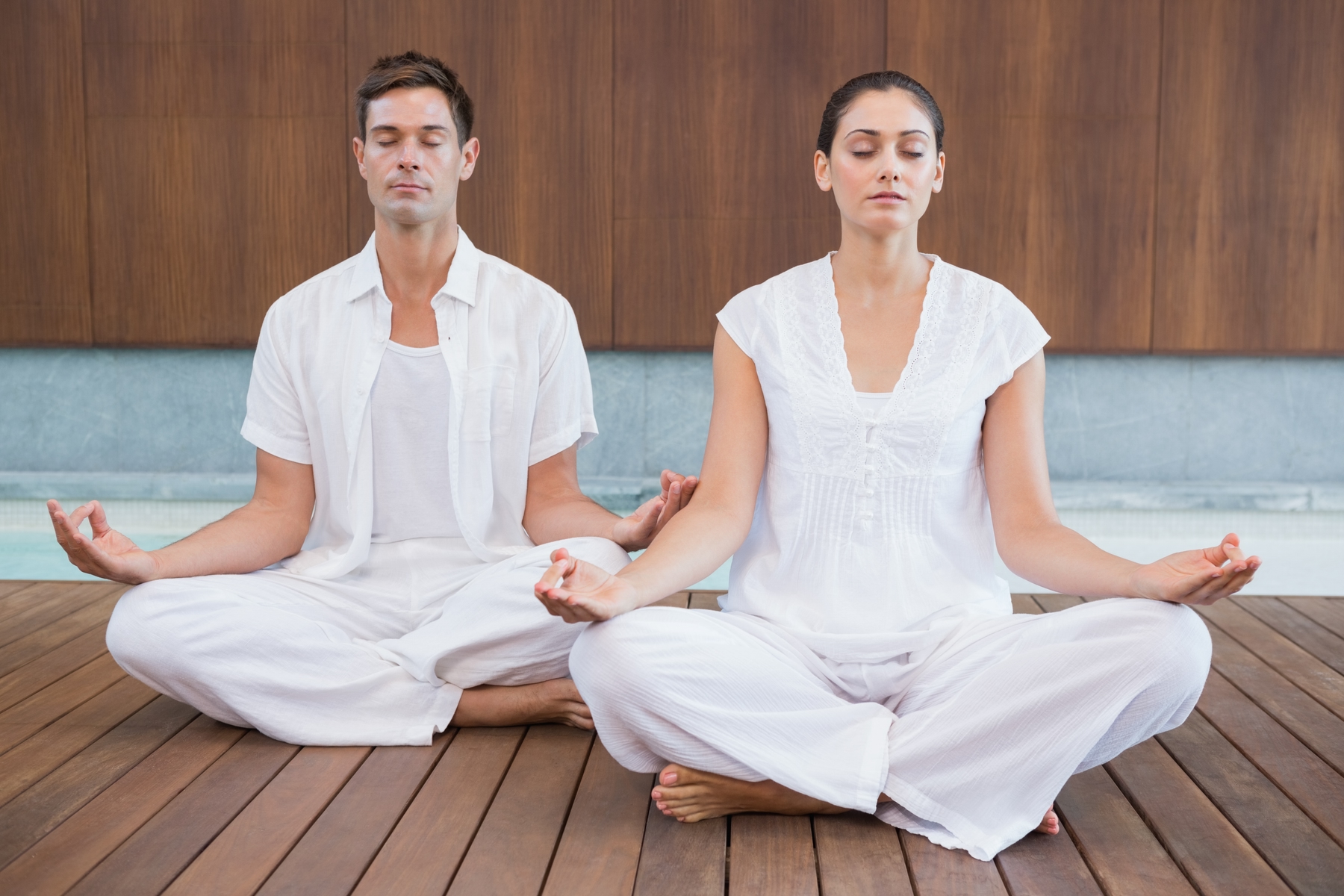 two people meditating in a peaceful space