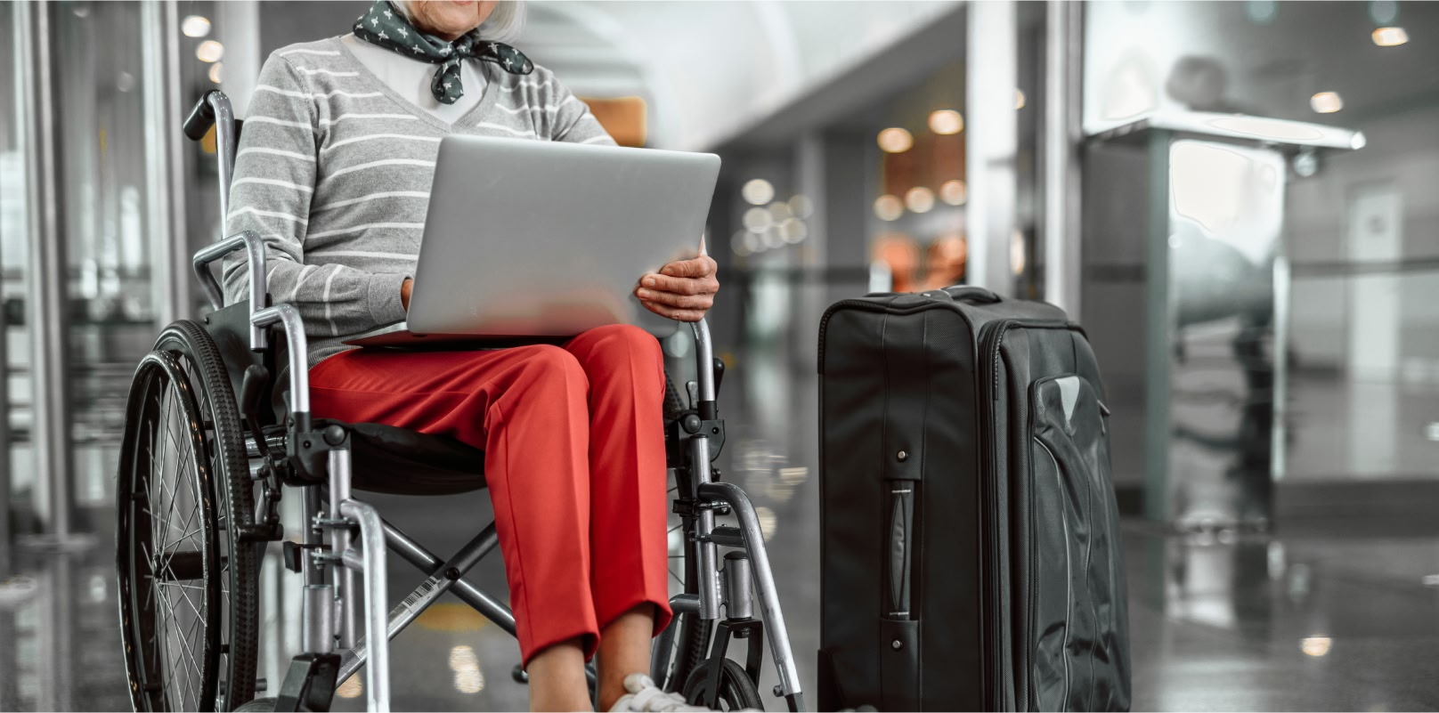 Image showing a wheelchair user at an airport.