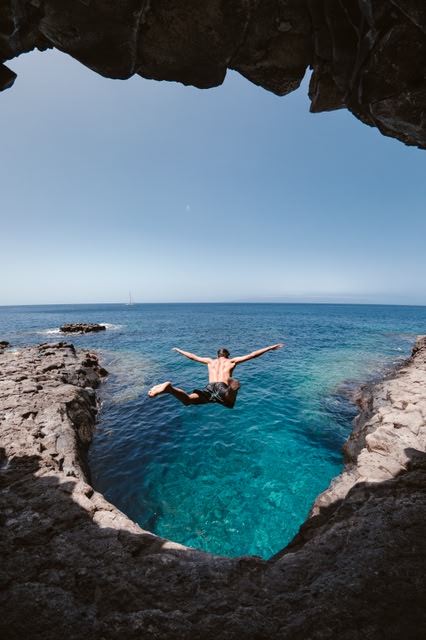 Man diving into water in Tenerife