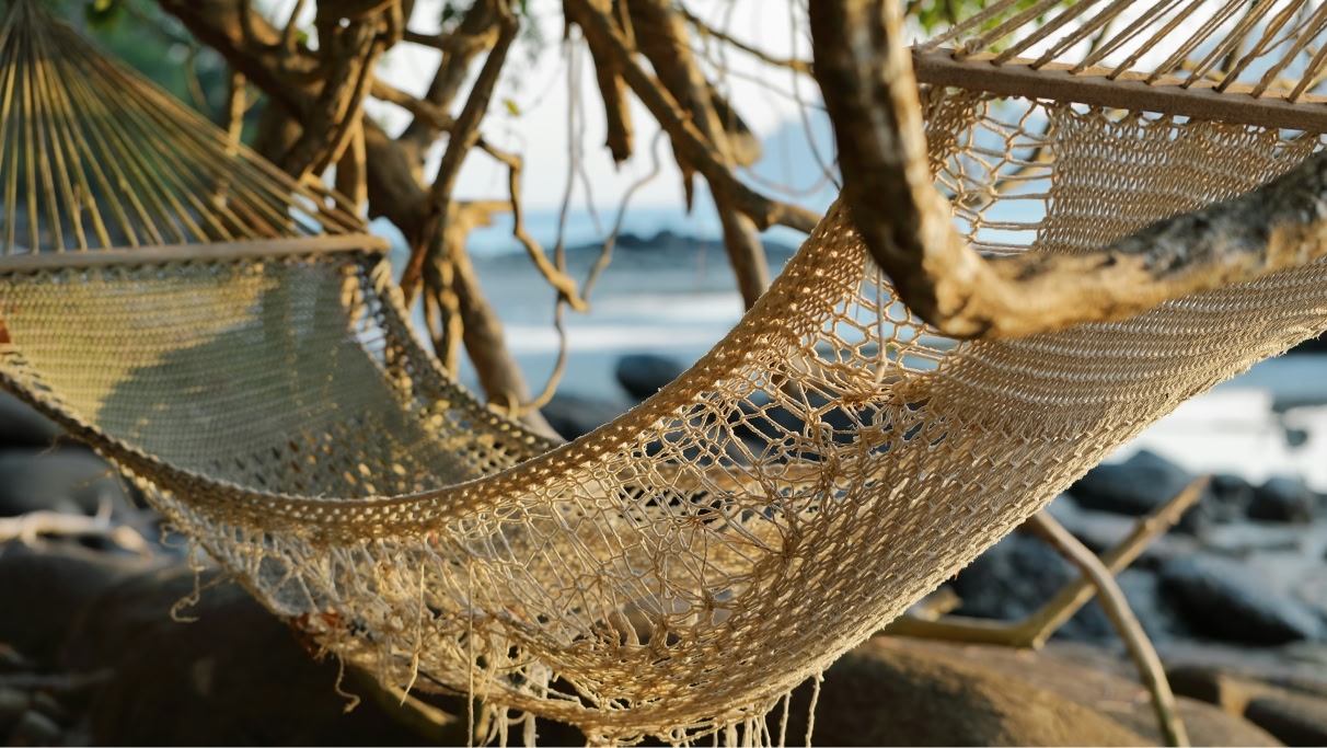 brown knit hammock by the sea