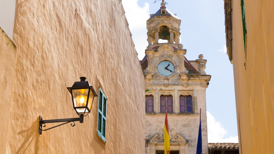 Old town street with clock tower