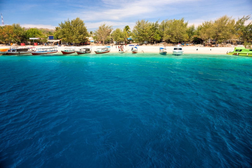 Die Gili Inseln bei Bali betören mit weißen Stränden und klarem Wasser.