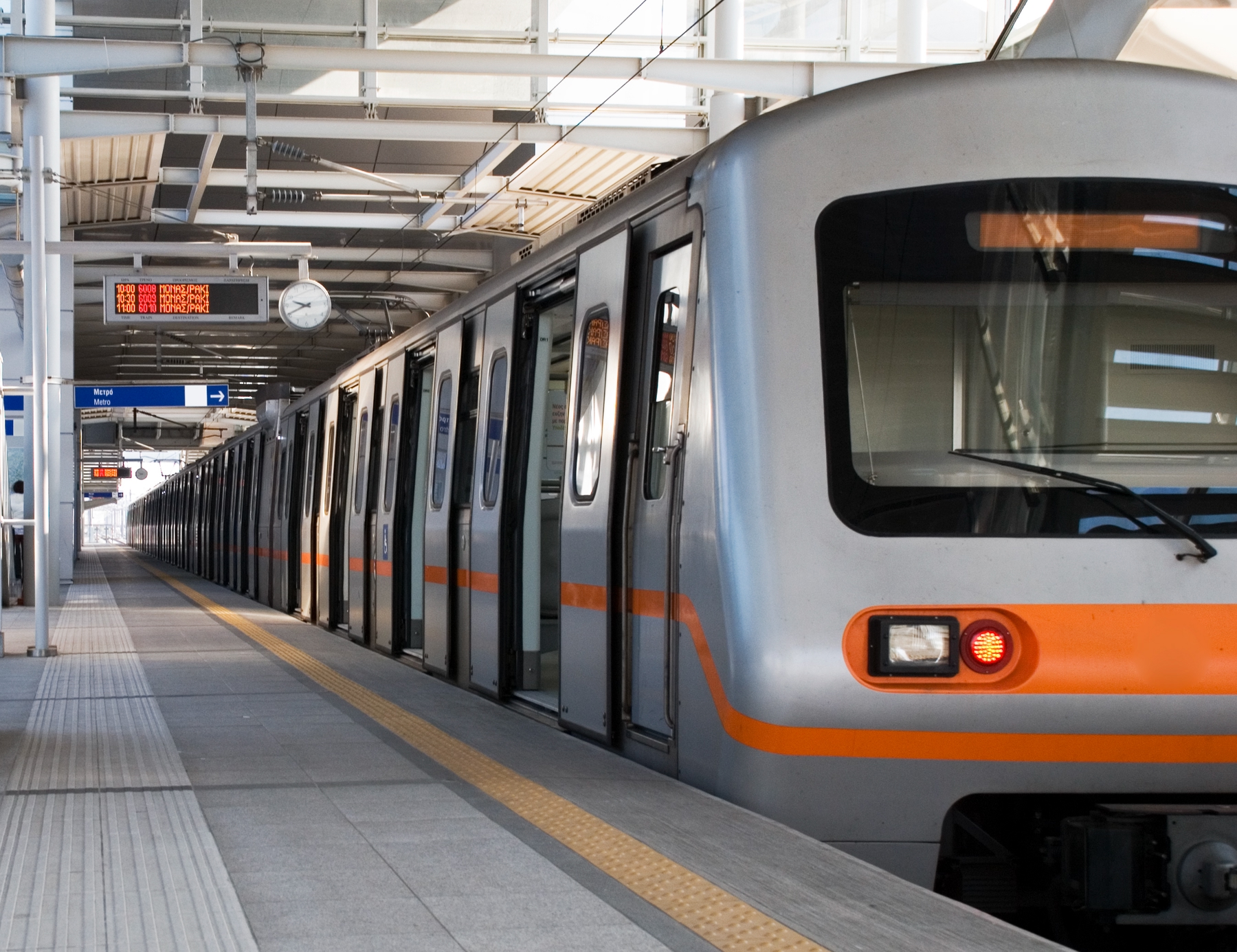 high-speed train stopping at a station in Greece