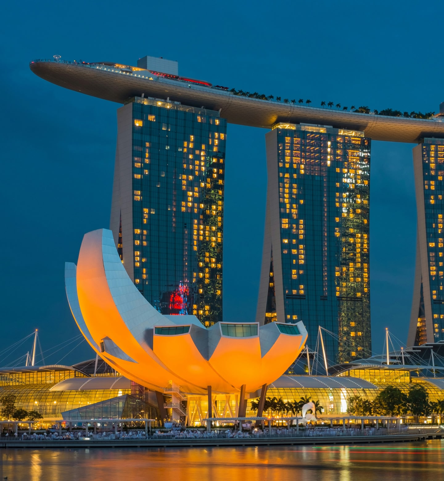 Orange light illuminated a sculptural building at the waterfront by the Marina Bay Sands in Singapore.