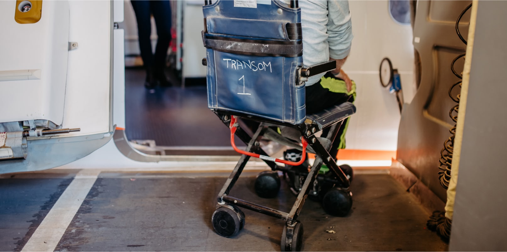 Image showing a passenger in a wheelchair boarding a plane
Travelers with disabilities should know their rights