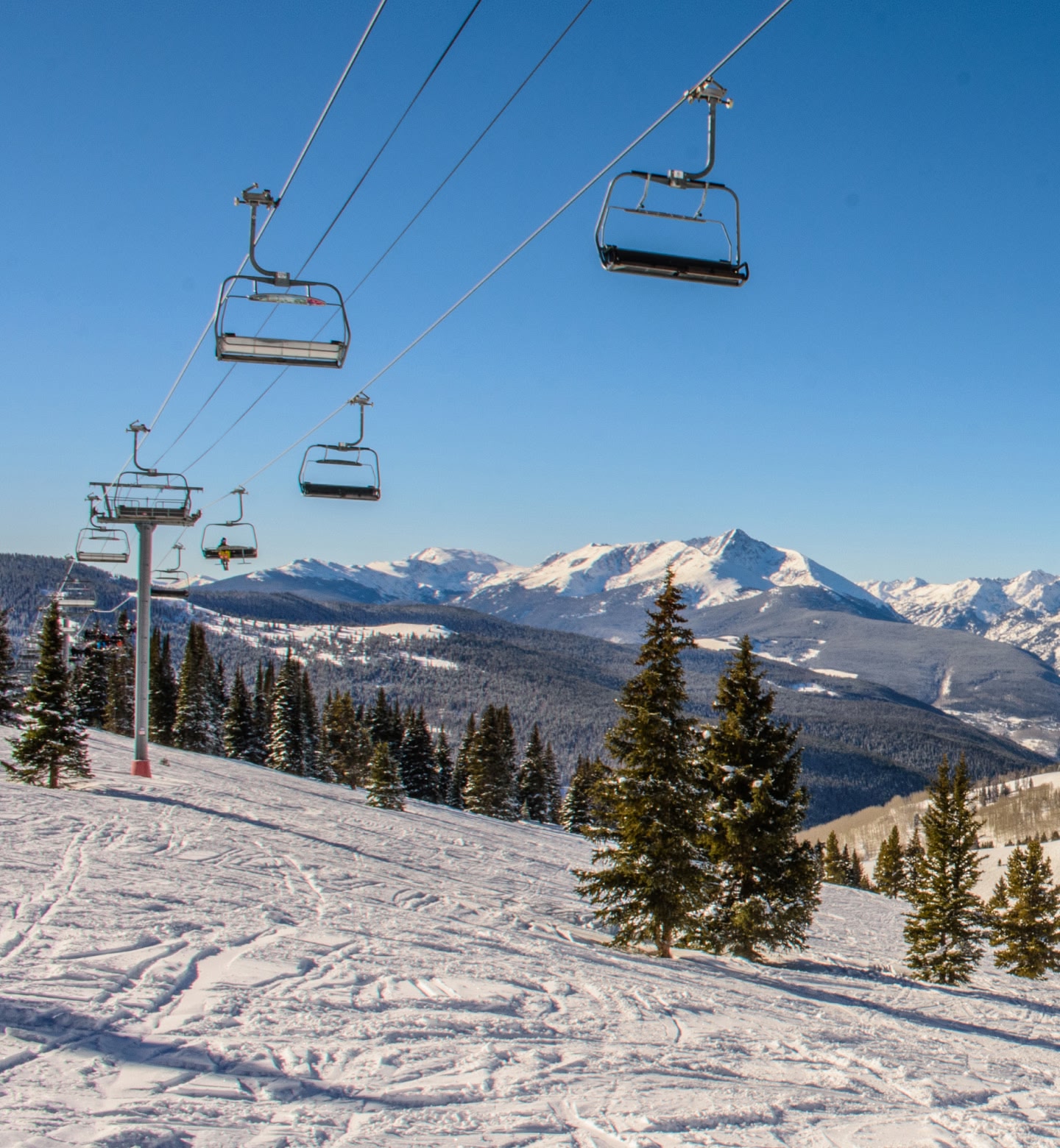 Chair lift for ski slopes in mountainous Vail Colorado