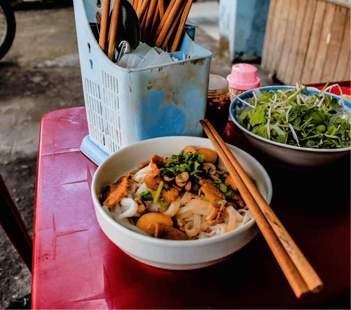 A picture of two noodle bowls on a table 