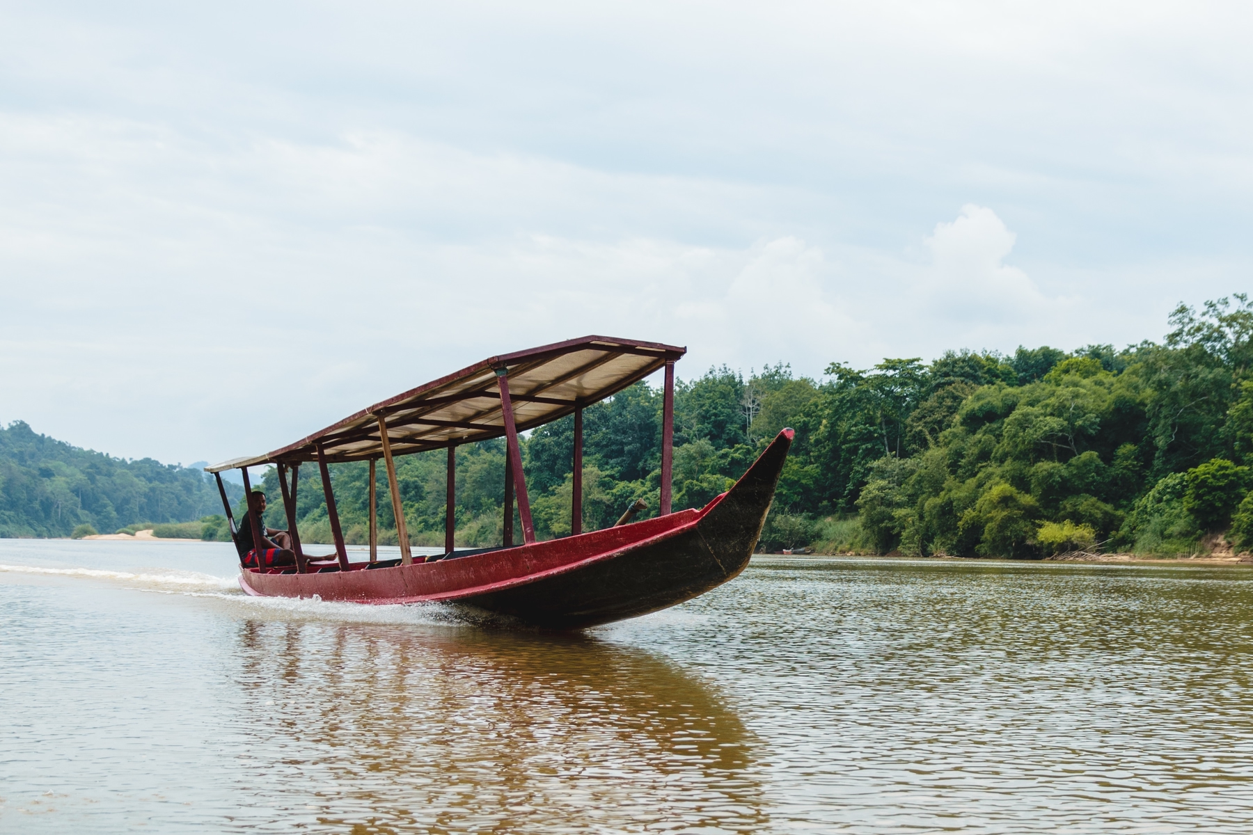 A typical wood boat found on the rivers of Taman Negara National Park in Kuala Lumpur, Malaysia.