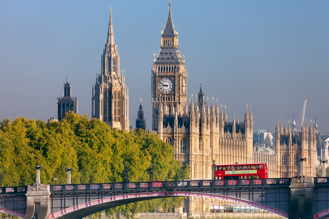 London double decker bus with Westminster Abbey in the background