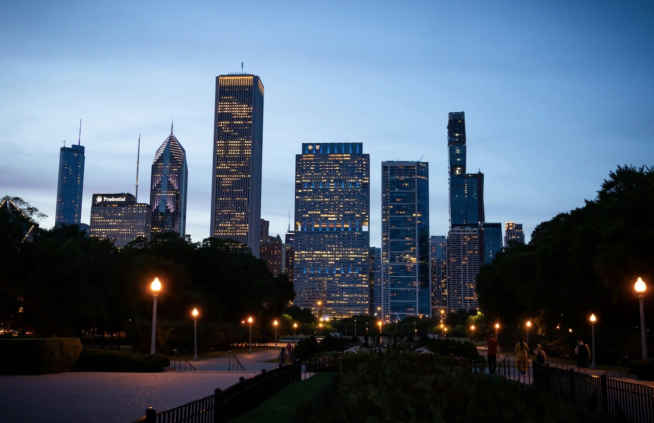 view of Millenium Park in Chicago with skyline in the evening. Host of Lollapalooza, one of the biggest music festivals in the USA.