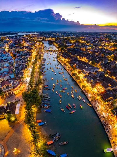 Aerial view of Hoi An Ancient Town with lantern boats on Hoai river, in Hoi An, Vietnam, south east asia