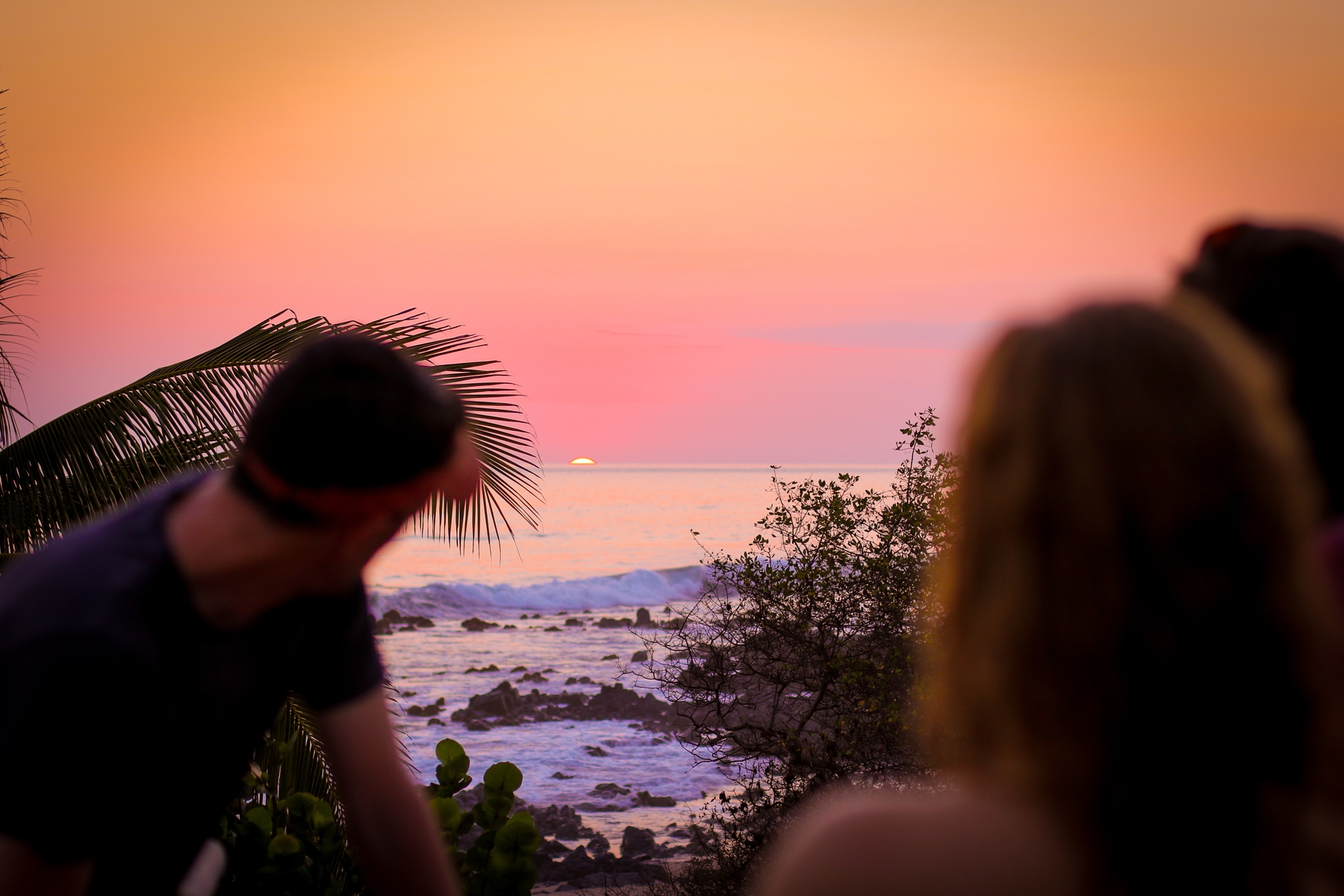 travellers watching the sunset in Troncones, Mexico. Travel and work remotely in Mexico.