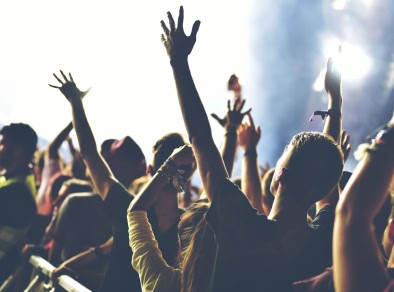 People dancing at a music festival
